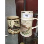 A Royal Worcester Palissy tankard depicting fish, and another