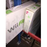 2 boxed Wii Fit boards.