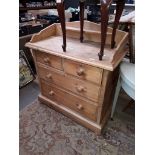 A pine chest of drawers