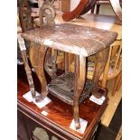 A small carved top table
