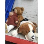 3 soft toys to include 2 bears and 1 dog.