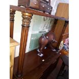 A reproduction inlaid console table