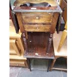 A small drop leaf cabinet together with an oak inlaid table