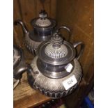 A pair of Royles Patent silver plated self-pouring teapots by James Dixon & Sons.