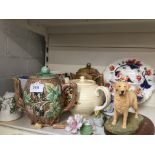 A collection of of mixed pottery including Majolica teapot