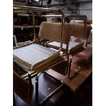 A set of four retro gilded chrome framed chairs
