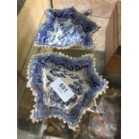 A pair of early 19th century willow pattern leaf shaped pottery dishes