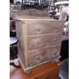 A small pine chest of 3 drawers