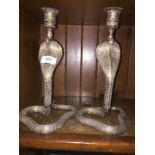 Pair of metal snake candlesticks