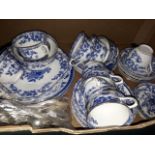 Box of blue and white china and silver plate cutlery