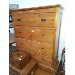 A pine chest of drawers