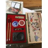 Chinese writing set and a Chinese purse.