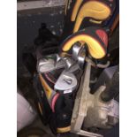 Golf trolley, golf bag and bundle of clubs