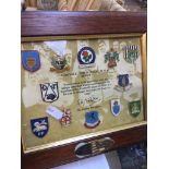 A framed collection of the club crests of the original founders of the Football League