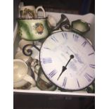 A box of pottery and a clock