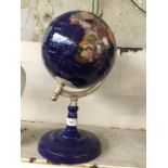 A gemstone terrestrial globe