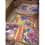A collection of 1950s comics including Superman.
