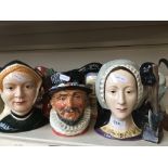 A group of seven Royal Doulton character jugs comprising Henry VIII, Falstaff, Anne Boleyn, The