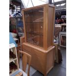 A Winsor modern light oak glazed top display cabinet