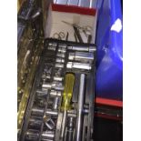 Socket set in case and few other tools.