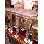 A two tier Indian carved side table
