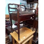 An Edwardian inlaid piano stool