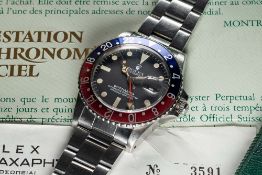 A RARE GENTLEMAN'S STAINLESS STEEL ROLEX OYSTER PERPETUAL GMT MASTER "PEPSI" BRACELET WATCH DATED