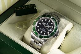 A GENTLEMAN'S STAINLESS STEEL ROLEX OYSTER PERPETUAL DATE "ANNIVERSARY" SUBMARINER BRACELET WATCH