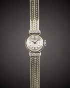 A LADIES 18K SOLID WHITE GOLD & DIAMOND OMEGA BRACELET WATCH CIRCA 1962, WITH BRUSHED SILVER DIAL