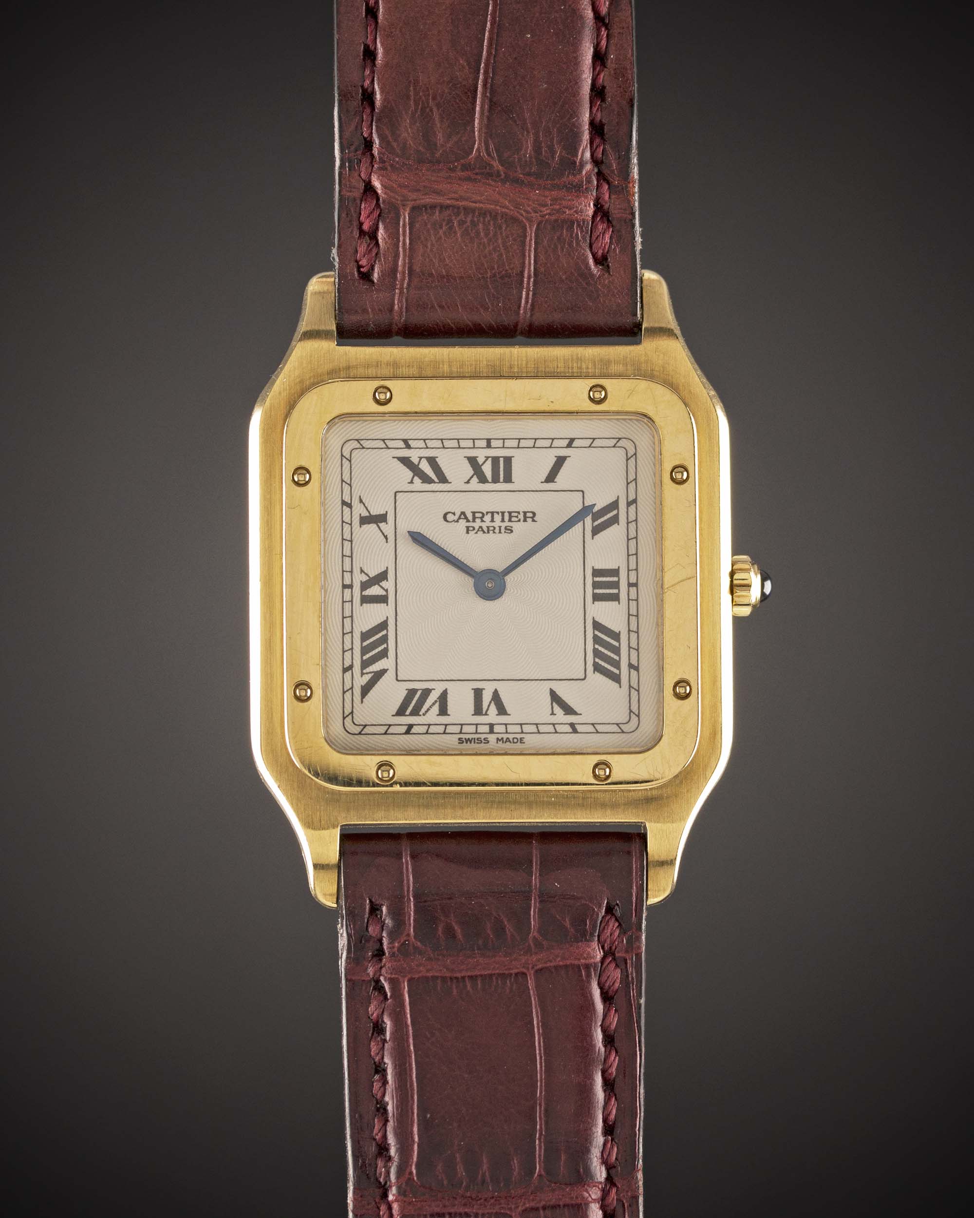 A GENTLEMAN'S SIZE 18K SOLID GOLD CARTIER SANTOS DUMONT MECANIQUE WRIST WATCH CIRCA 1990s, REF.