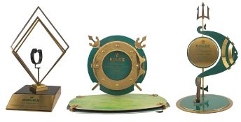 TWO RARE GILT METAL & ENAMEL ROLEX SUBMARINER WATCH STANDS & ONE GILT METAL & MARBLE ROLEX