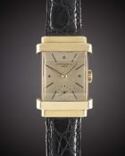 A GENTLEMAN'S 18K SOLID YELLOW GOLD PATEK PHILIPPE RECTANGULAR "TOP HAT" WRIST WATCH CIRCA 1940s