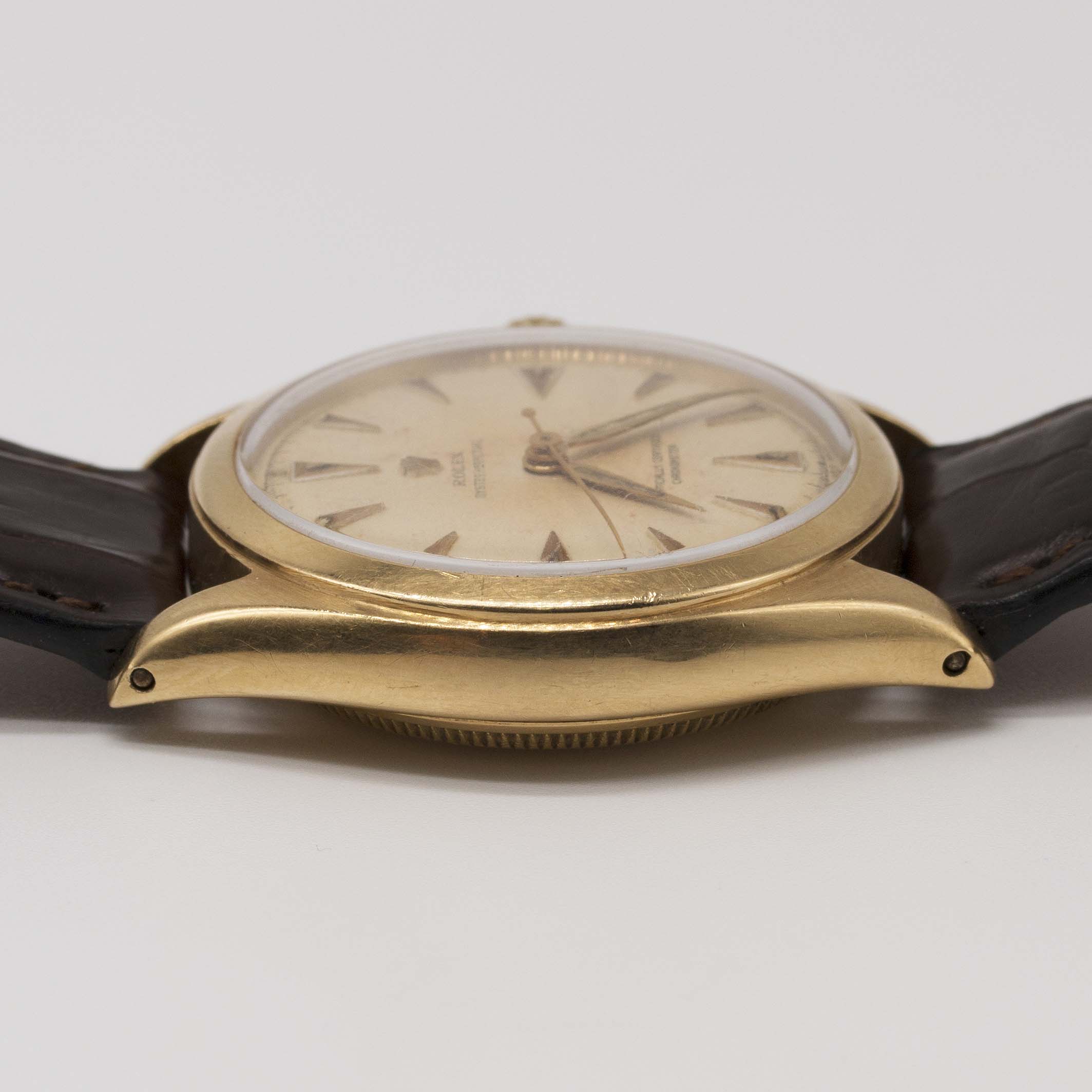 A GENTLEMAN'S 18K SOLID YELLOW GOLD ROLEX OYSTER PERPETUAL WRIST WATCH CIRCA 1952, REF. 6084 WITH " - Image 10 of 10