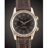 A GENTLEMAN'S 18K SOLID ROSE GOLD GIRARD PERREGAUX TRAVELLER II GMT ALARM WRIST WATCH CIRCA 2000s,