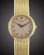 A FINE GENTLEMAN'S 18K SOLID YELLOW GOLD PATEK PHILIPPE CALATRAVA BRACELET WATCH CIRCA 1990s, REF.