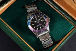 A RARE GENTLEMAN'S STAINLESS STEEL ROLEX OYSTER PERPETUAL "PINK PANTHER" GMT MASTER BRACELET WATCH