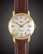 A GENTLEMAN'S 18K SOLID GOLD LONGINES FLAGSHIP AUTOMATIC WRIST WATCH CIRCA 1961, REF. 3404 WITH