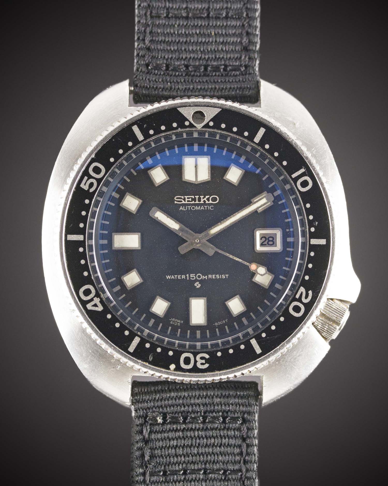 A GENTLEMAN'S STAINLESS STEEL SEIKO "TURTLE" 150M AUTOMATIC DIVERS WRIST WATCH CIRCA 1975, REF.