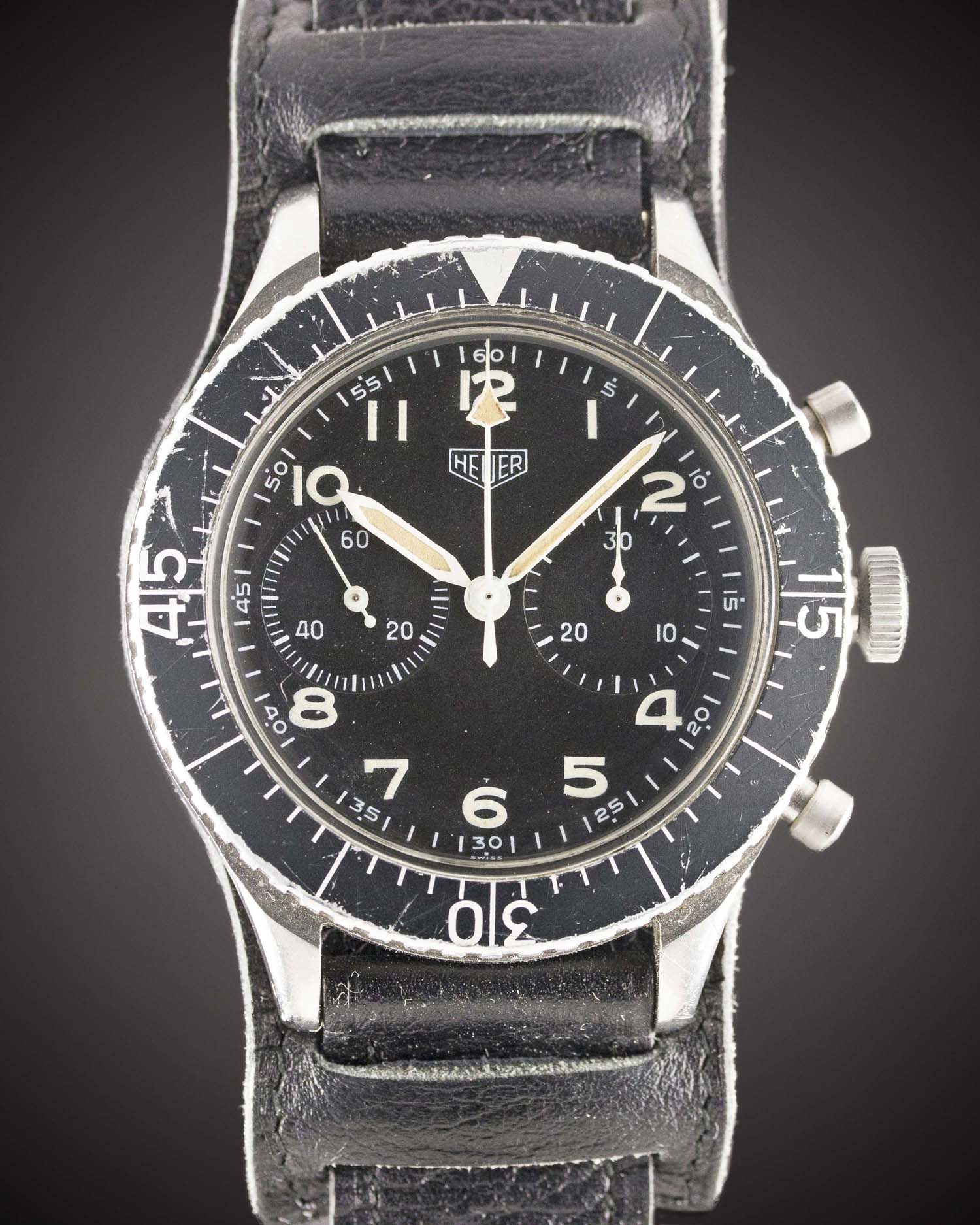 A GENTLEMAN'S STAINLESS STEEL GERMAN MILITARY HEUER "BUND" FLYBACK CHRONOGRAPH WRIST WATCH CIRCA