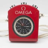 AN OMEGA SPLIT SECONDS CHRONOGRAPH TIMER IN ORIGINAL FITTED PLASTIC CASE WITH SHOULDER STRAP CIRCA