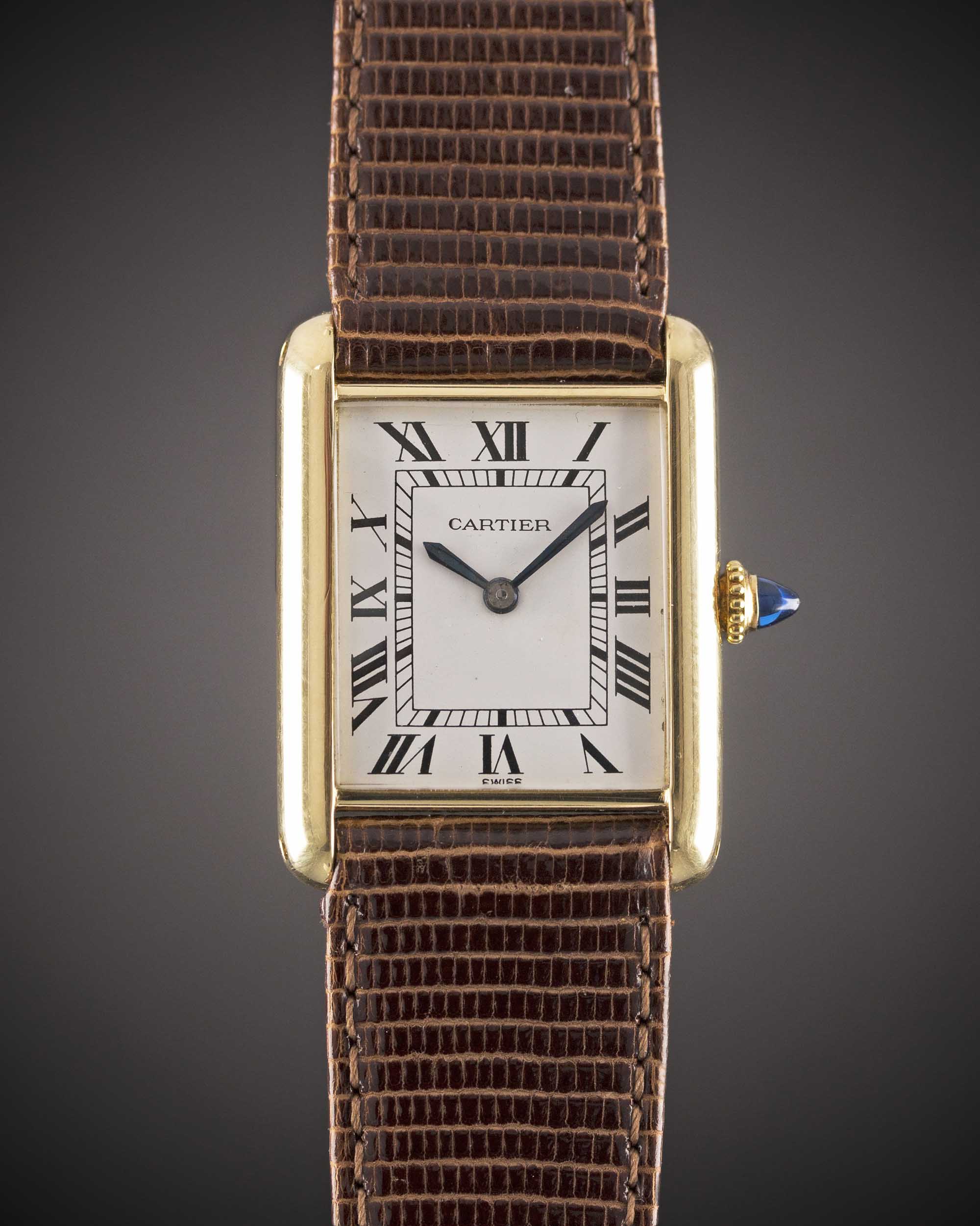 A GENTLEMAN'S SIZE 18K SOLID GOLD CARTIER TANK WRIST WATCH CIRCA 1980s Movement: Manual wind, signed