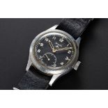 A VERY RARE GENTLEMAN'S STAINLESS STEEL BRITISH MILITARY GRANA W.W.W. WRIST WATCH CIRCA 1945, THE