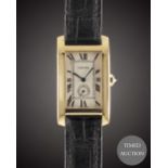 A GENTLEMAN'S SIZE 18K SOLID GOLD CARTIER TANK AMERICAINE WRIST WATCH CIRCA 1990, REF. 811905