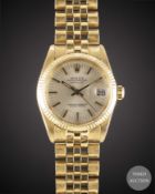 A MID SIZE 18K SOLID GOLD ROLEX OYSTER PERPETUAL DATEJUST BRACELET WATCH CIRCA 1979, REF. 6827