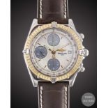 A GENTLEMAN'S SIZE STEEL & GOLD BREITLING CHRONOMAT WRIST WATCH CIRCA 2000s, REF. D13050.1 WITH