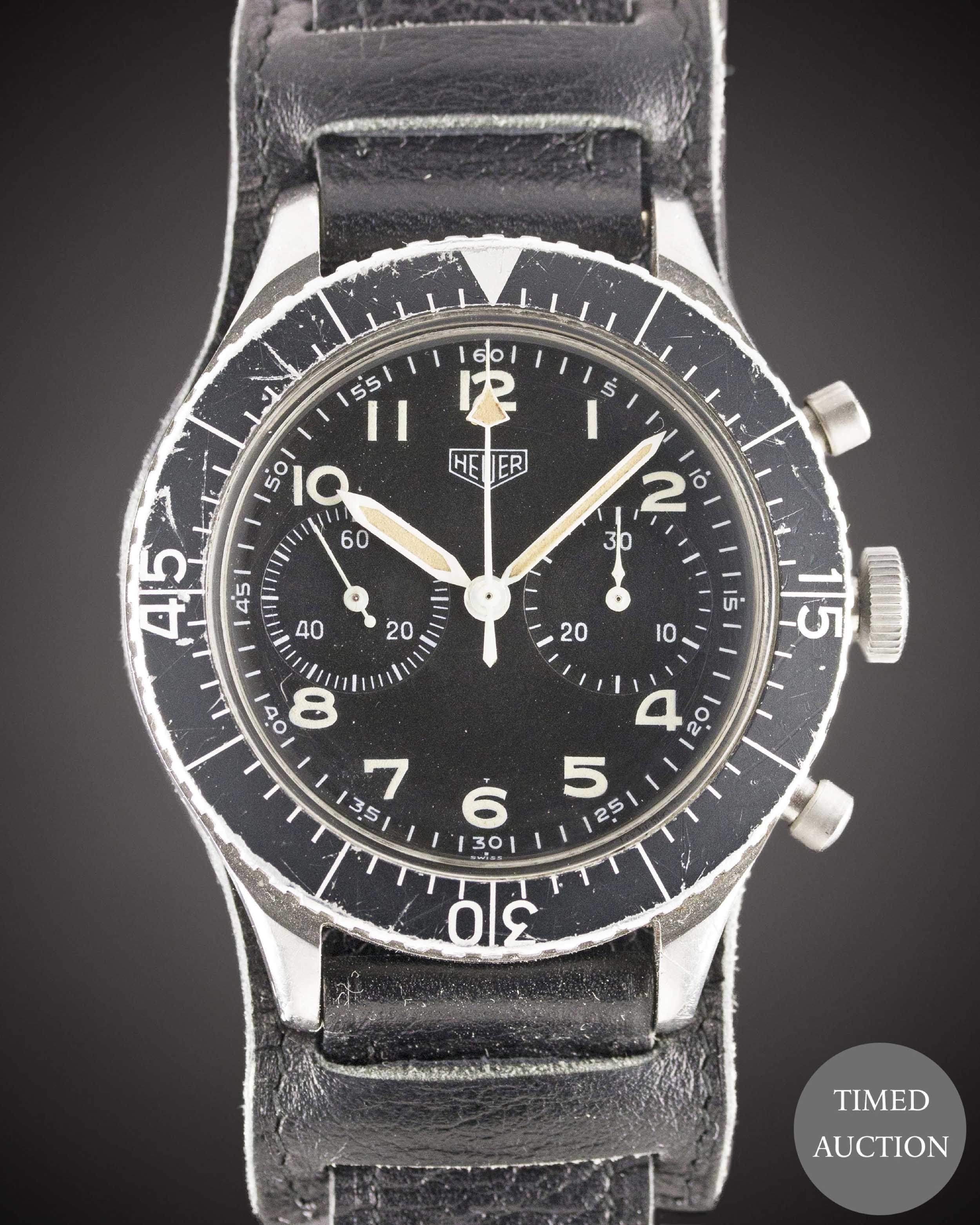 A GENTLEMAN'S STAINLESS STEEL GERMAN MILITARY HEUER "BUND" FLYBACK CHRONOGRAPH WRIST WATCH CIRCA