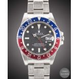 A GENTLEMAN'S STAINLESS STEEL ROLEX OYSTER PERPETUAL GMT MASTER BRACELET WATCH CIRCA 1980s, REF.