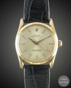A GENTLEMAN'S 14K SOLID GOLD ROLEX OYSTER PERPETUAL "BOMBE" WRIST WATCH CIRCA 1966, REF. 1011