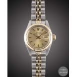 A LADIES STEEL & GOLD ROLEX OYSTER PERPETUAL DATE BRACELET WATCH CIRCA 1980, REF. 6917 WITH