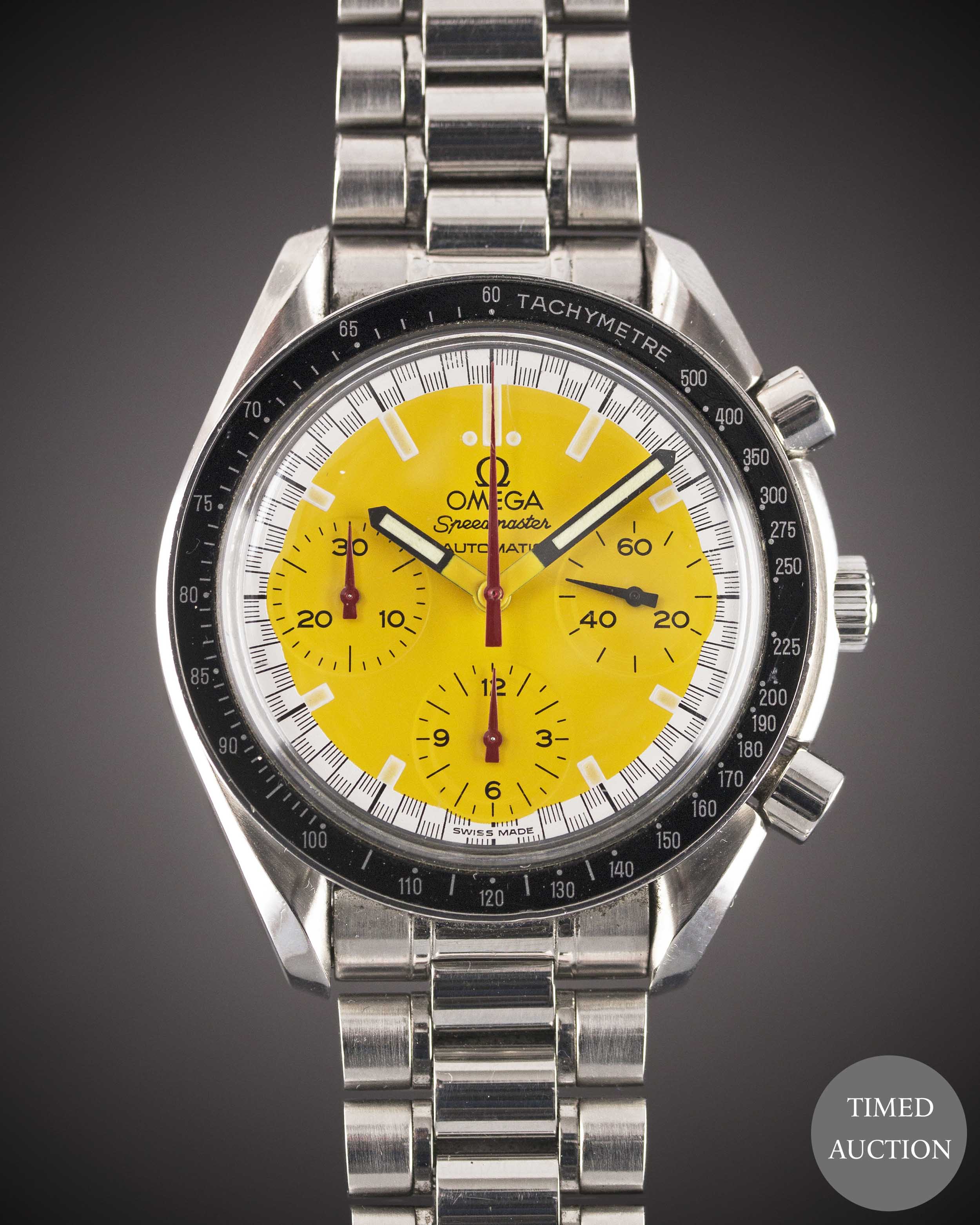 A GENTLEMAN'S STAINLESS STEEL OMEGA SPEEDMASTER "SCHUMACHER" AUTOMATIC CHRONOGRAPH BRACELET WATCH